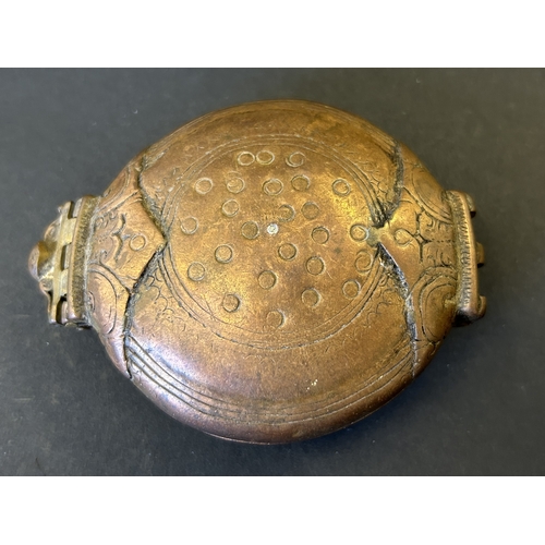 246 - An antique copper Indonesian betel nut lime box or Chuna-Dani, it was used to contain lime paste whi... 