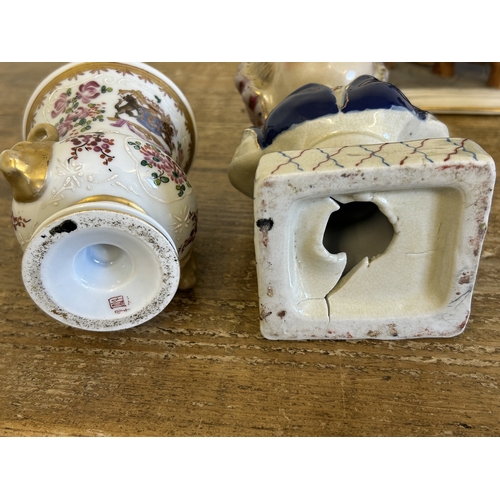 259 - A pair of late 19th Century Samson armorial urn vases, approx. 4 1/4