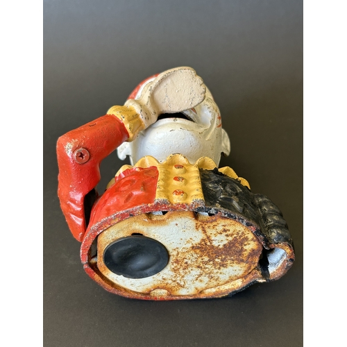 266 - A vintage hand painted clown mechanical money box, 6 3/4