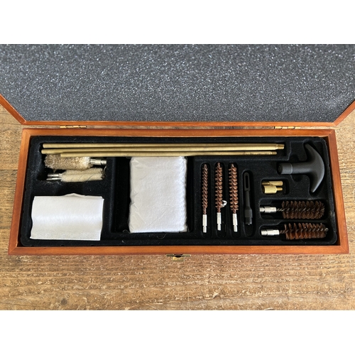 269 - A boxed gun barrel cleaning kit