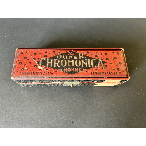 27 - A boxed vintage 'The Super Chromonica Harmonica' by M Hohner (box as found)