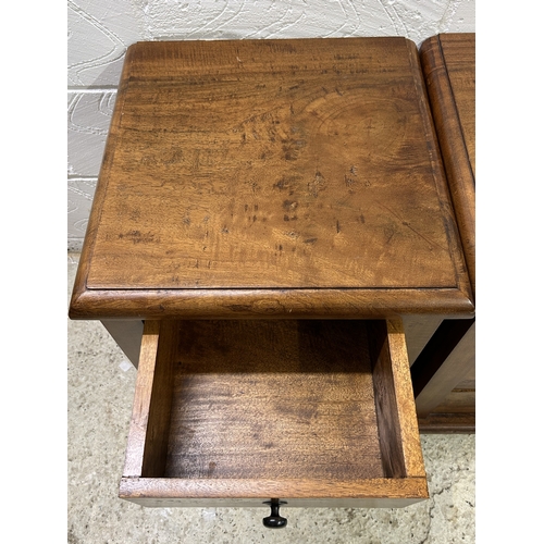 390 - A pair of vintage solid wood bedside chests of three drawers, approx. 24 1/4