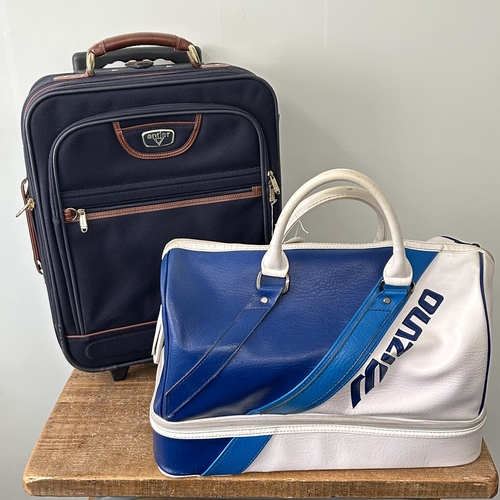 399 - A vintage sports bag plus a small suitcase with wheels, Antler and Mizuno