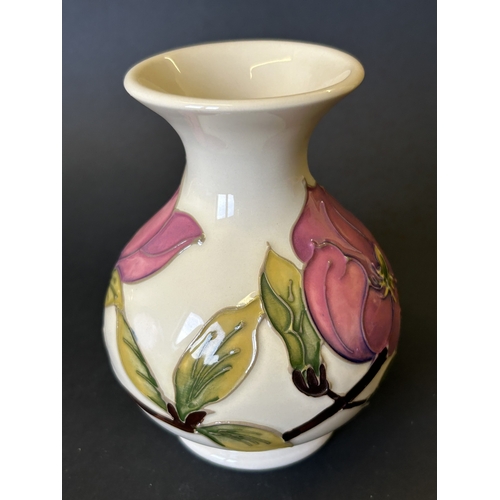 43 - A vintage Moorcroft vase in the 'Magnolia' pattern, approx. 5