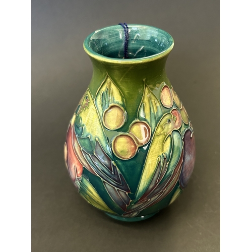 44 - A Moorcroft vase in the 'Finches Teal' pattern, designed by Sally Tuffin, circa 1990's , approx. 5 1... 