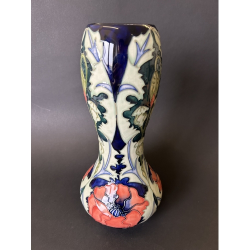 46 - A Moorcroft gourd shape vase in a poppy design by Rachel Bishop, circa 1990's, marked to base as a s... 