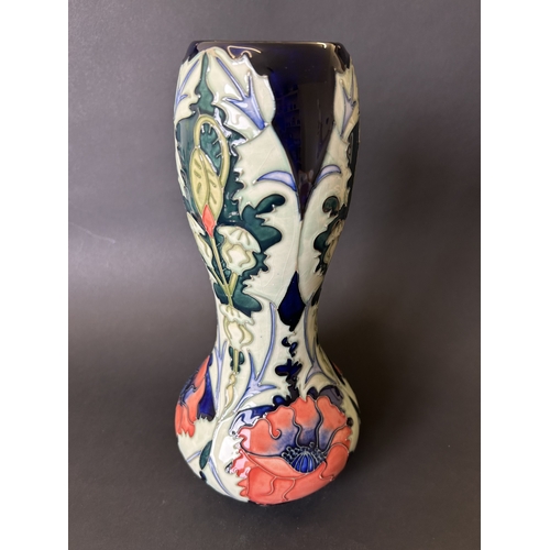 46 - A Moorcroft gourd shape vase in a poppy design by Rachel Bishop, circa 1990's, marked to base as a s... 