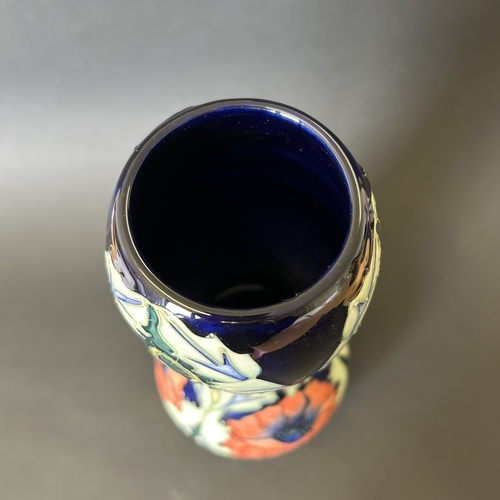 46 - A Moorcroft gourd shape vase in a poppy design by Rachel Bishop, circa 1990's, marked to base as a s... 