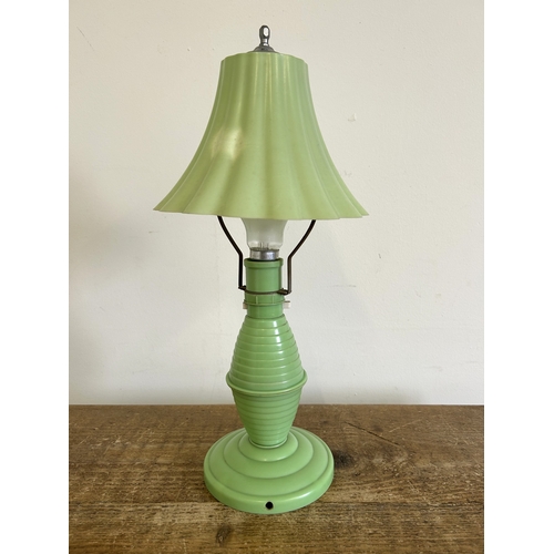 65 - An Art Deco period Bakelite plastic table lamp, approx. 14