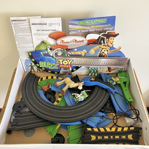 70 - A boxed Toy Story Micro Scalextric Slot Racing Set (contents disturbed and box with storage wear)