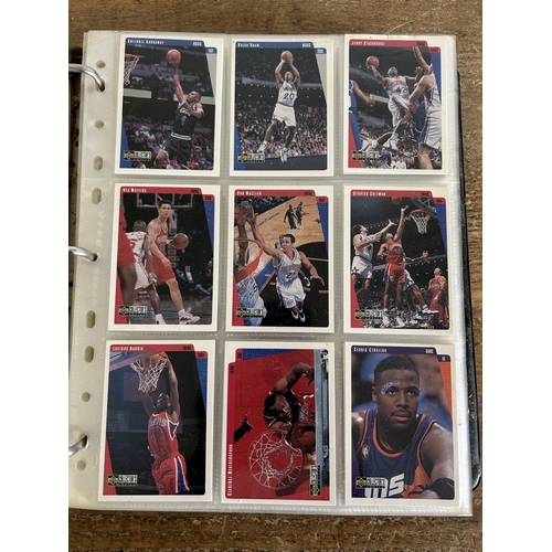 89 - An extensive collection of Upper Deck NBA trading cards in a grey folder