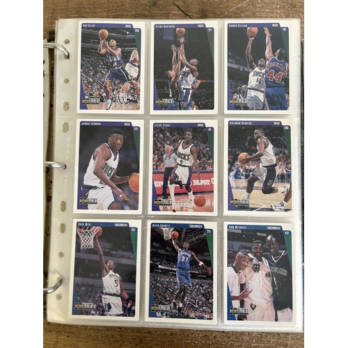 89 - An extensive collection of Upper Deck NBA trading cards in a grey folder