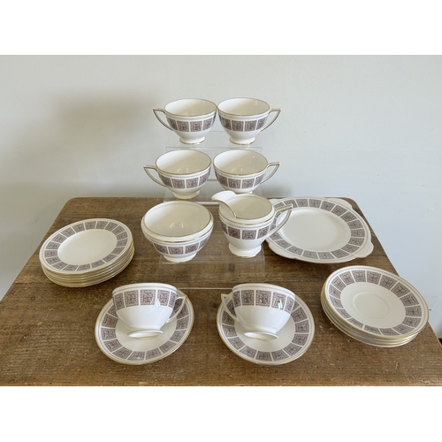 A Minton part tea set in the 'Acanthus' pattern, six setting with cake ...