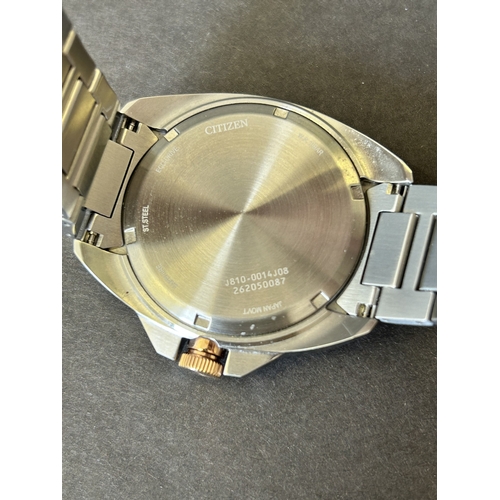 103 - A gentlemans Citizen Eco-Drive two tone blue dial wristwatch, boxed with certificate etc (runs and t... 