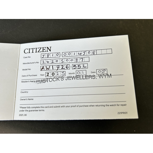 103 - A gentlemans Citizen Eco-Drive two tone blue dial wristwatch, boxed with certificate etc (runs and t... 