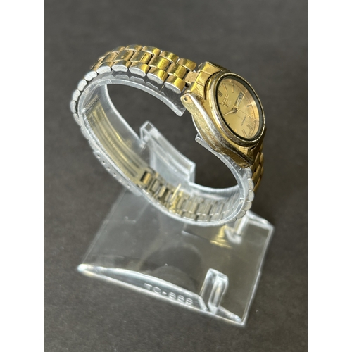 113 - A ladies Seiko 5 2906-0850 automatic wristwatch, 24mm dia (runs and ticks, wear on metalware, marks ... 