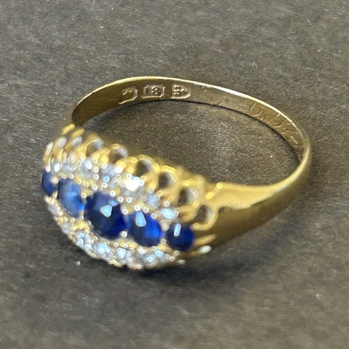 135 - An 18ct gold with sapphire and diamonds ring, engraving to inside of shank, approx. size L, weight a... 