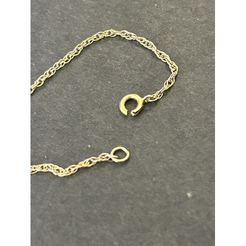 140 - A 9ct gold and orange stone set pendant and chain, total weight approx. 1.9g (the chain has an as fo... 