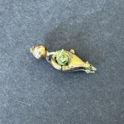 155 - A selection of loose most likely amber beads, formally strung on a silver clasp plus coral coloured ... 