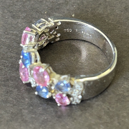 163 - A 750 (18ct) white gold ring with original paperwork from Winsor Bishop Norwich, details as follows:... 