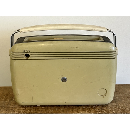384 - A vintage battery operated Bush radio, 12 3/4
