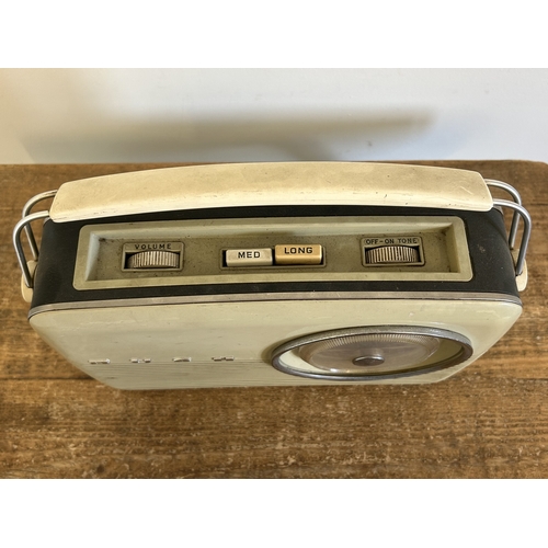 384 - A vintage battery operated Bush radio, 12 3/4