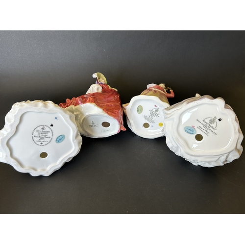 39 - Four Royal Doulton figurines to include 'Bells Across the Valley' HN4300, 'Finishing Touch' HN4329, ... 