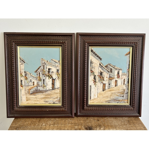 397 - A pair of vintage oils on canvas of possibly Spanish town scenes, both bear signature lower right, p... 