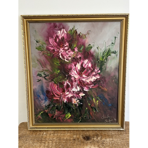 398 - A framed heavy oil on canvas of a still life of flowers, bears signature lower right, possibly Charl... 