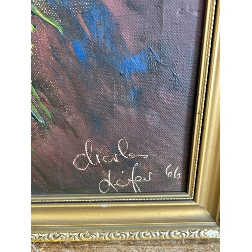 398 - A framed heavy oil on canvas of a still life of flowers, bears signature lower right, possibly Charl... 