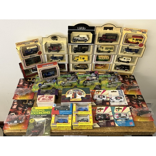 63 - A mixed box of new and boxed die cast collectors vehicles including Playmates Toys, Ninja Turtles, J... 