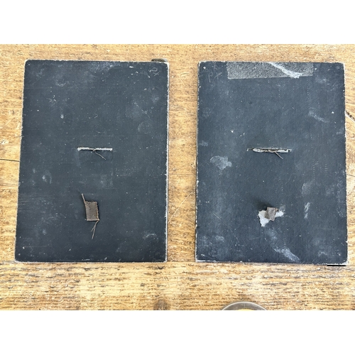 85 - A pair of white metal bird decorated photo frames, approx. 6