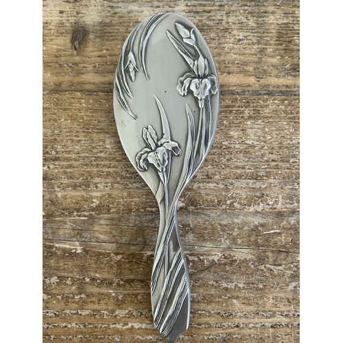 85 - A pair of white metal bird decorated photo frames, approx. 6