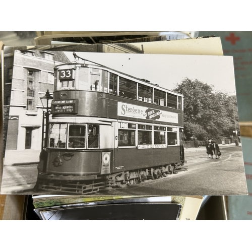 91 - A selection of vintage postcards and Red Cross First Aid books