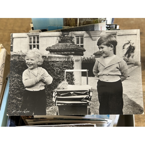 91 - A selection of vintage postcards and Red Cross First Aid books