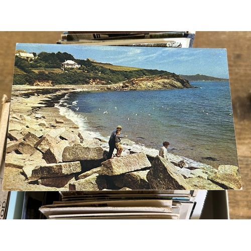 91 - A selection of vintage postcards and Red Cross First Aid books