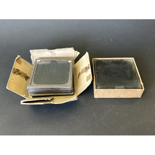 92 - A selection of 23 vintage magic lantern photographic slides, one group (approx. 16) are mostly India... 