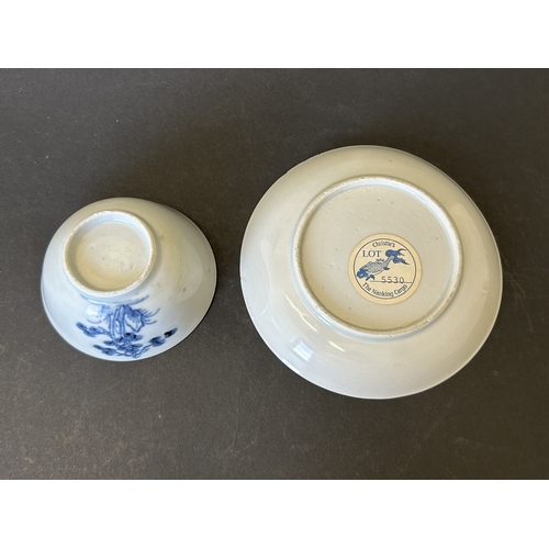 94 - An antique Nanking Cargo blue and white tea bowl and saucer, bears Christies Nanking Cargo label to ... 