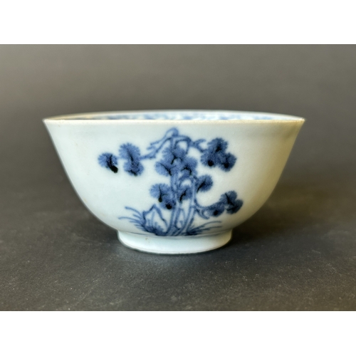 94 - An antique Nanking Cargo blue and white tea bowl and saucer, bears Christies Nanking Cargo label to ... 
