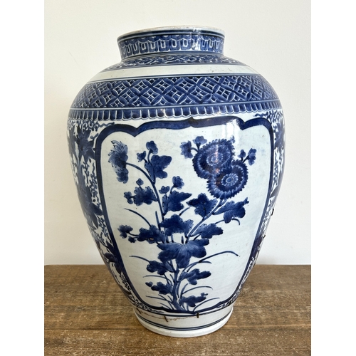 96 - A large Chinese ceramic blue and white hand painted vase, approx. 18 1/2
