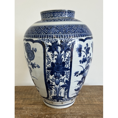 96 - A large Chinese ceramic blue and white hand painted vase, approx. 18 1/2