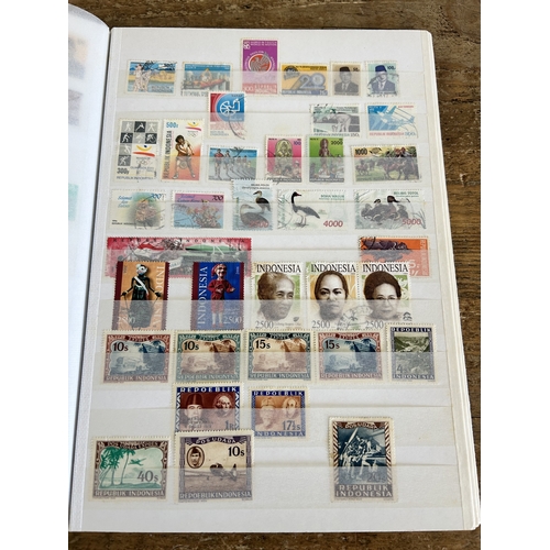361 - Five stamp stock books to include mint stamps, all well displayed including Guernsey, Coco Islands, ... 