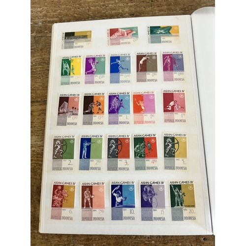 361 - Five stamp stock books to include mint stamps, all well displayed including Guernsey, Coco Islands, ... 