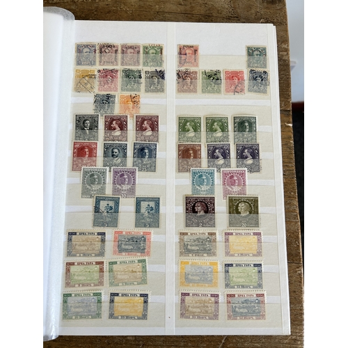 366 - Four stock books of stamps to include two books of Eire stamps, all hinged, one book of German stamp... 