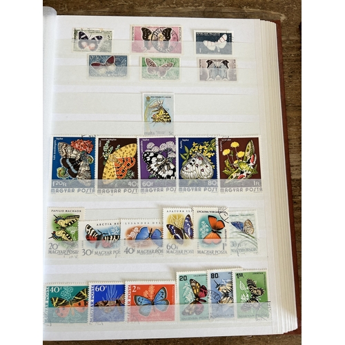 366 - Four stock books of stamps to include two books of Eire stamps, all hinged, one book of German stamp... 