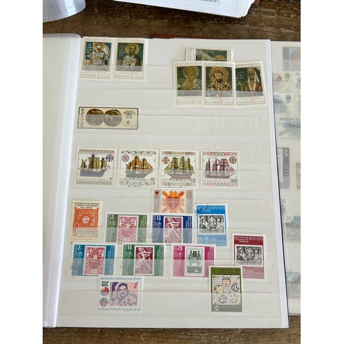 367 - Four stock books of stamps including mint stamps to include France, British Colony, Bermuda/Barbados... 