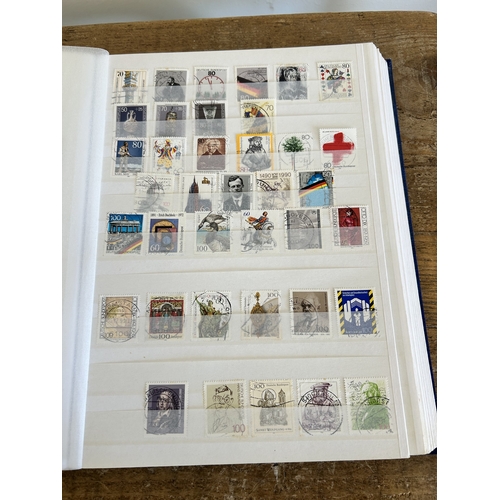 372 - A good stamp album of mixed countries together with two very good stock books of stamp albums for Ho... 