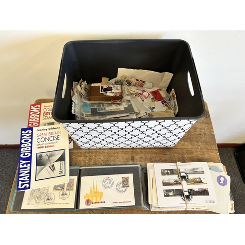 375 - A large tub of loose stamps plus first day covers of mixed countries etc together with some informat... 