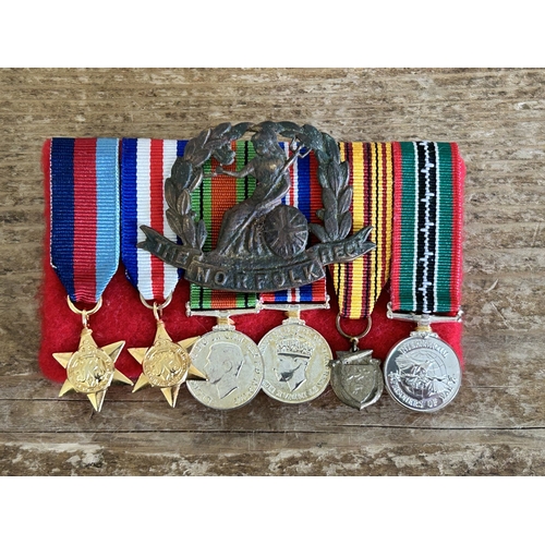 A set of modern reproduction WW2 and later miniature medals together ...