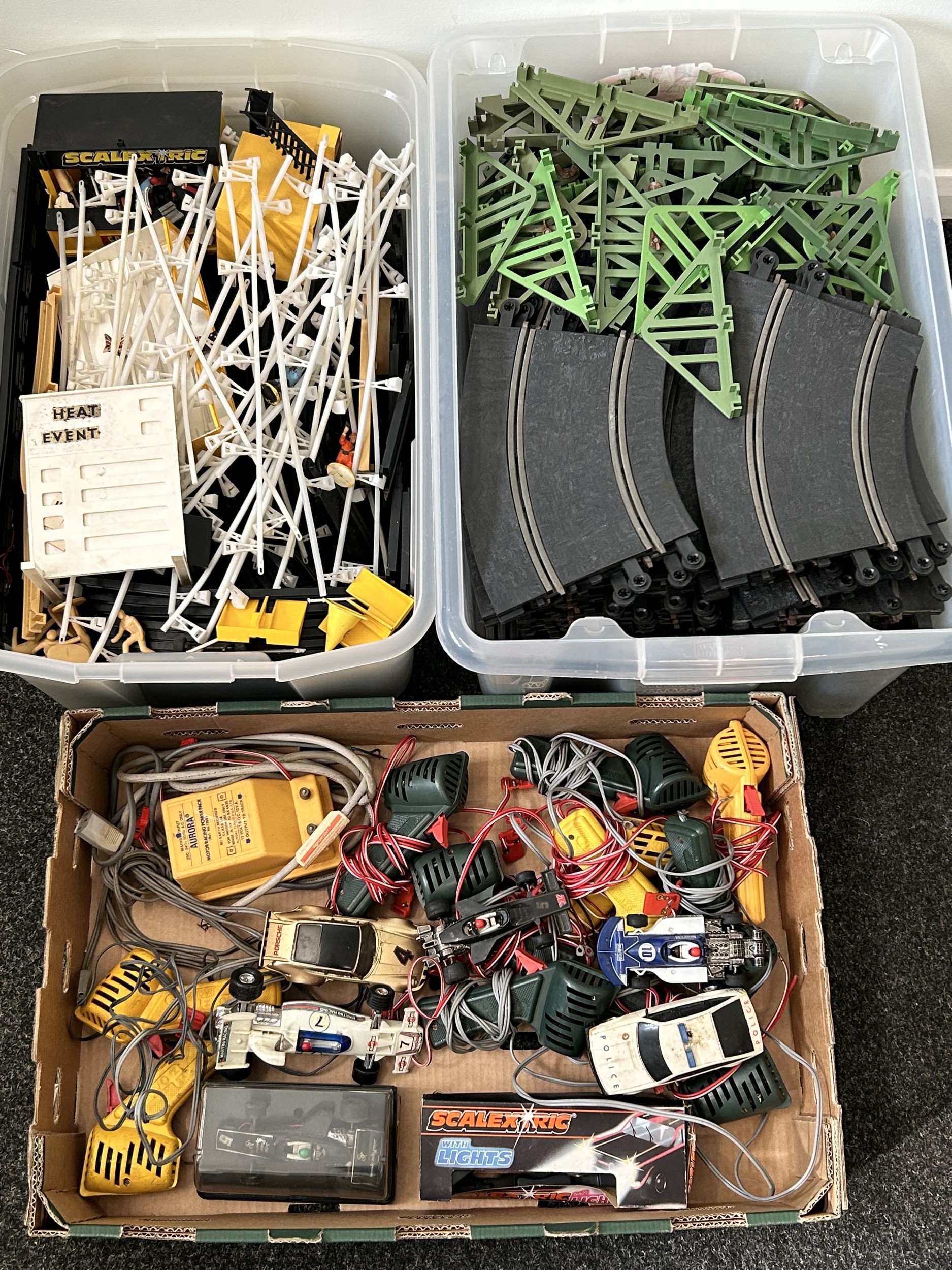 Three boxes of Scalextric to include track, cars, controllers and ...